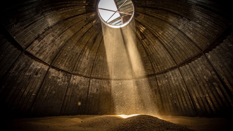 Ominous interior view of an empty grain bin confined space